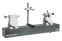Concentricity tester with a granite bench incl. tailstocks and measuring stand. Flatness of the measuring bench according to DIN 876 Grade 1 up to 1600 mm length with T-slot for tailstock pair and measuring stand. Tailstocks optionally with or without hardened V blocks.